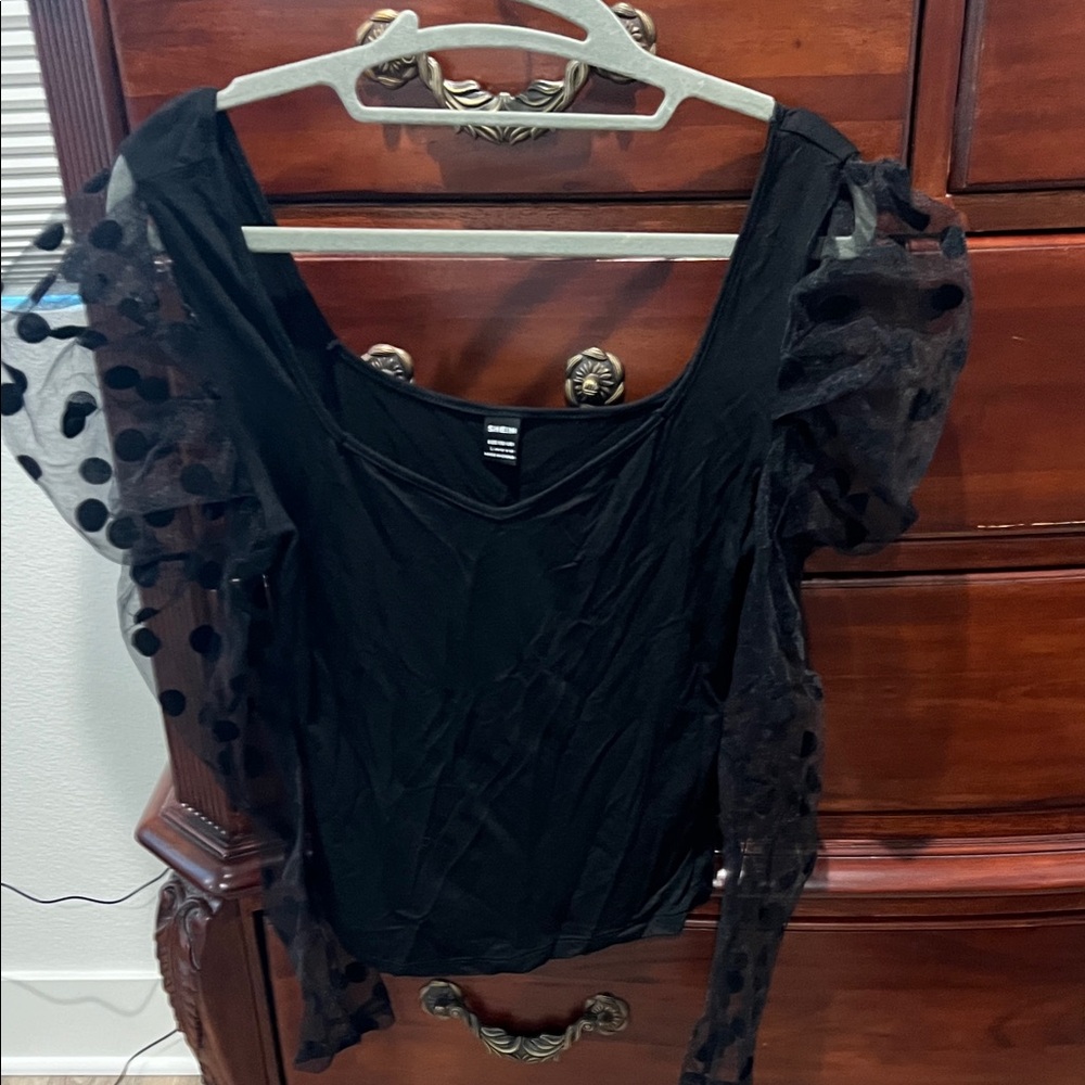 SHEIN Black Top with Sheer Polka Dot Sleeves